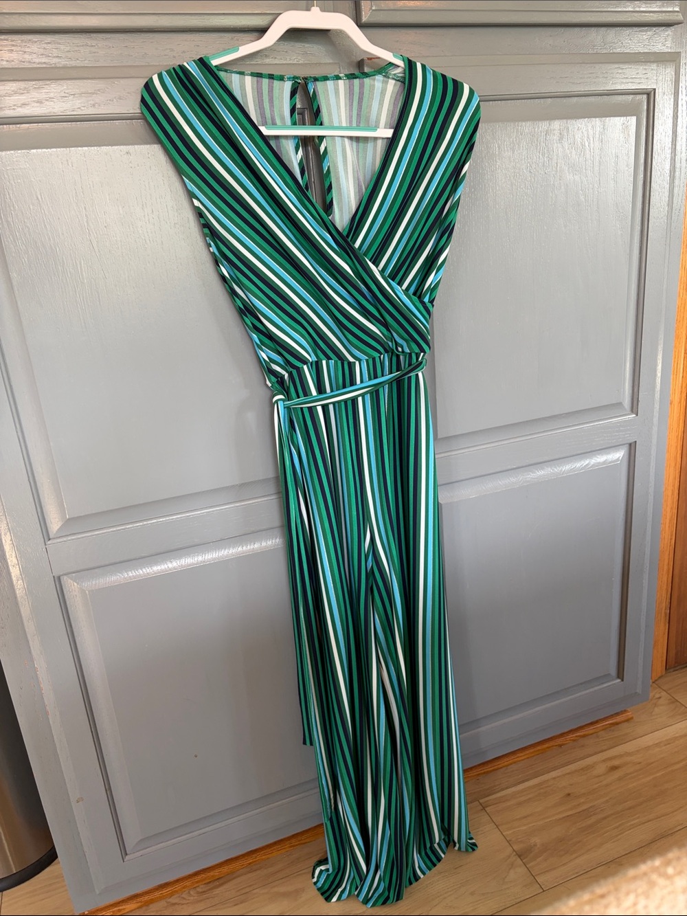 Striped Green V-Neck Wrap Jumpsuit with belt.
